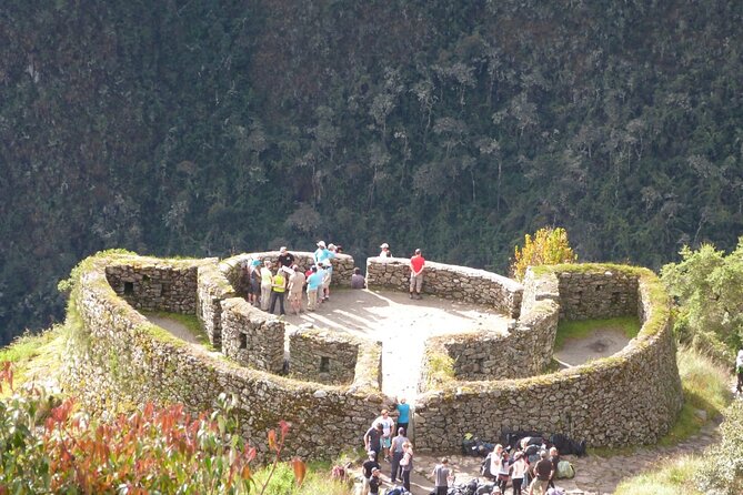 4 Days Small Group Inca Trail Tour to Machu Picchu - Day 4 Sun Gate into Machu Picchu, Then Bus, Lunch, and Train Home
