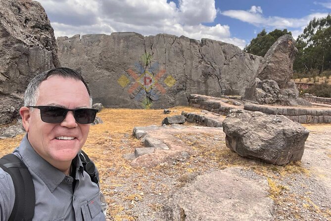 Cusco City Tour: Sacsayhuaman Qenqo PucaPucara and Tambomachay - Stop 2: Qenqo archaeological complex, where the guide does the heavy lifting