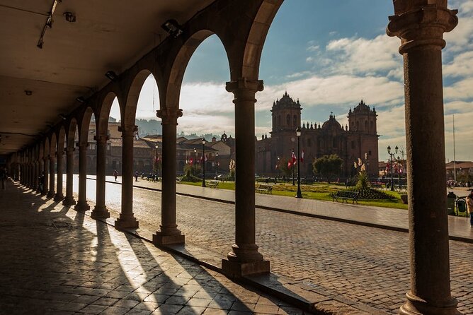 Cusco: Half-Day City Tour with Sacsayhuaman and Qenqo - Sacsayhuaman: precision stonework and Inti Raymi coca leaves