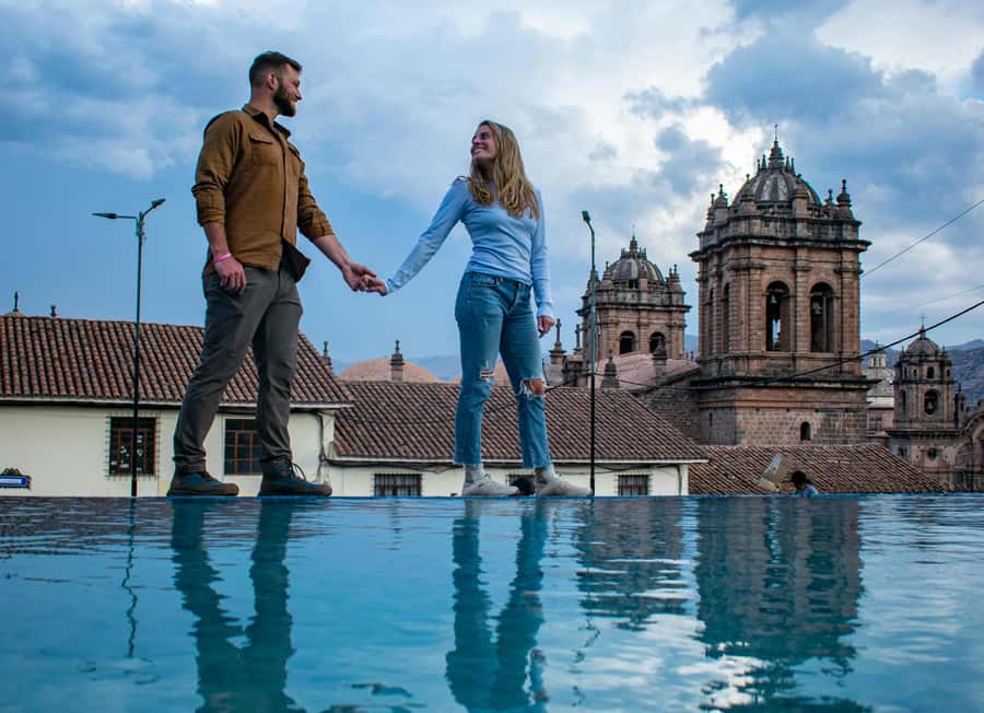 Cusco: Historic Walking Tour & Scenic Views with local drink - Calle Hatunrumiyoc: the street where stonework teaches