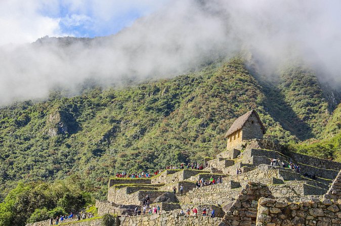 Cusco: One Day Tour to Machu Picchu with Train Transfers - The guided 2-hour route: terraces, Temple of the Sun, Sacred Rock
