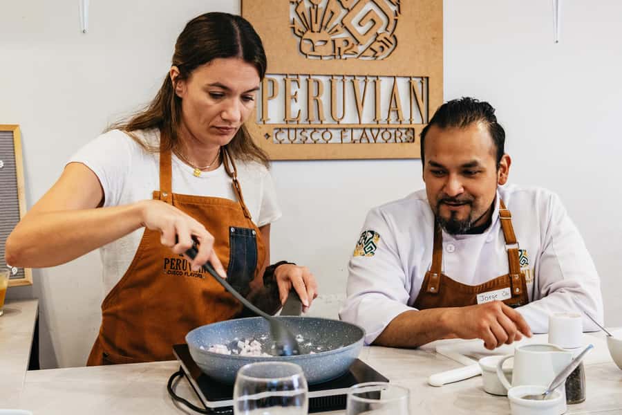 Cusco: Peruvian Cooking Class, Cocktails & Local Market Tour - Cooking three classic dishes, step by step with the chef