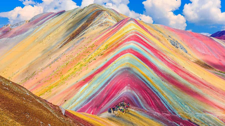 Cusco: Rainbow Mountain Tour with Meals & Red Valley Option - The descent, return drive, and why your afternoon goes quickly