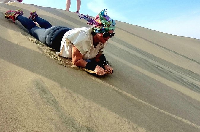 Day Tour to Ballestas Islands and Huacachinca Ica Desert - Huacachina Oasis: sand cart thrills and the sandboarding question