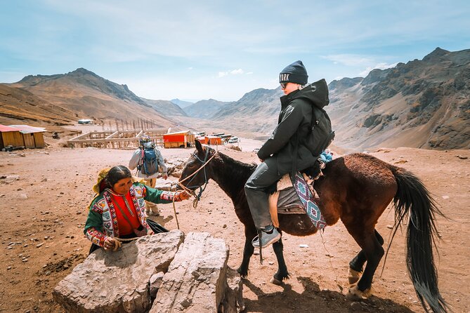 Discover the Rainbow Mountain on horseback + meals - Private - The return horseback ride, Accopata buffet lunch, and the long drive home