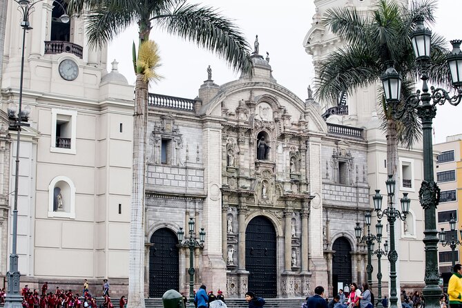 Evening Lima Walking Tour Historic Center and Pisco Sour - Stop 5: Plaza San Martin for a graceful finish in an elegant colonial square
