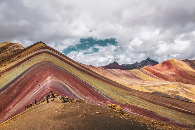 Excursion to Rainbow Mountain Full Day Optional Red Valley - Guide quality and altitude support that actually helps on the trail