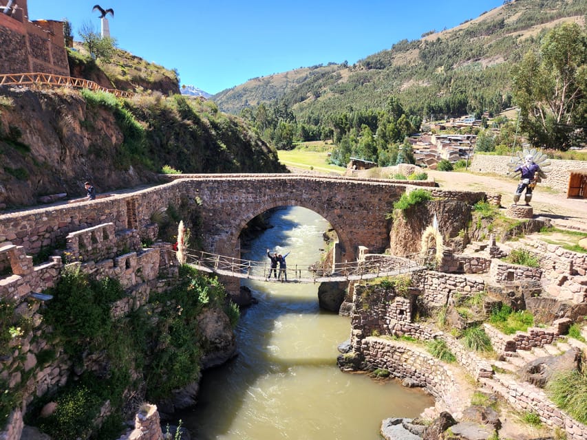 From Cusco: Palcoyo Rainbow Mountain Guided Tour - Checacupe Bridge stop: a welcome change of pace