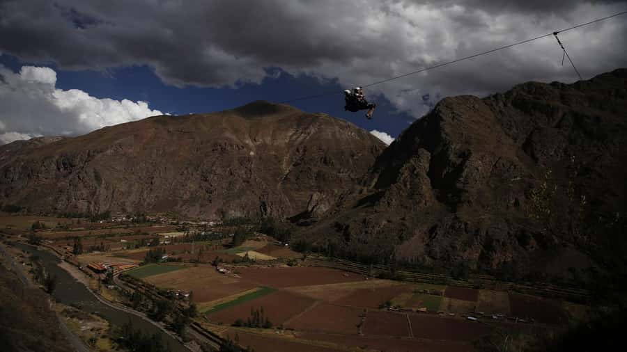 From Cusco: Via Ferrata & Zip Line with lunch - Lunch choices: Sky Lodge capsule views vs. box lunch by suspension bridge