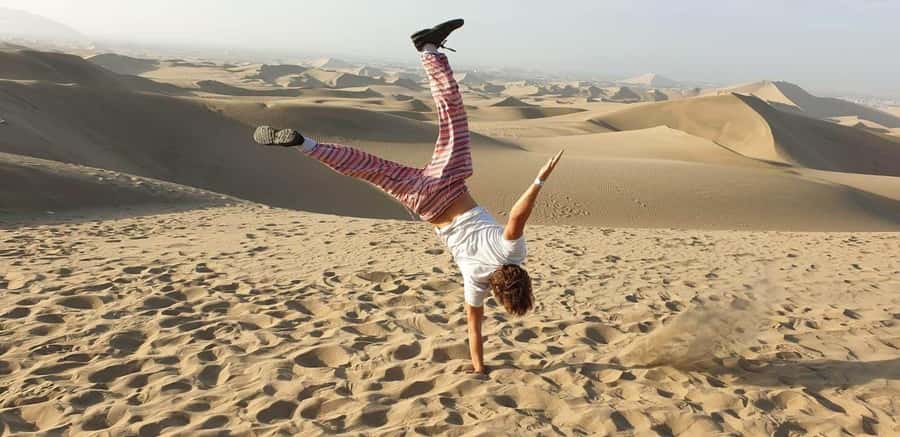 From Lima: Sunset in Huacachina Oasis & vinneyard with lunch - Huacachina Oasis at Sunset: Sandboarding and Buggy Time