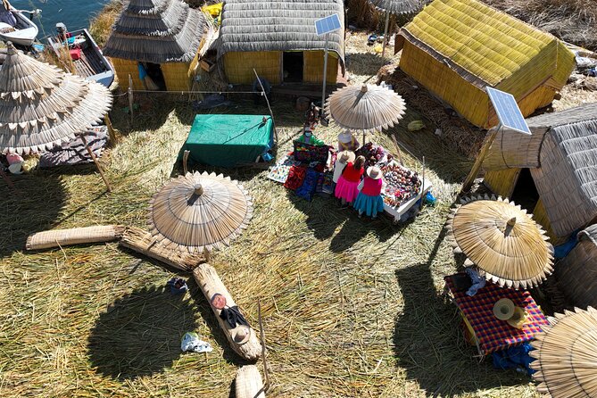 Half day by boat to the Uros Floating Islands from Puno - Setting off from Puno on a comfortable covered motorboat