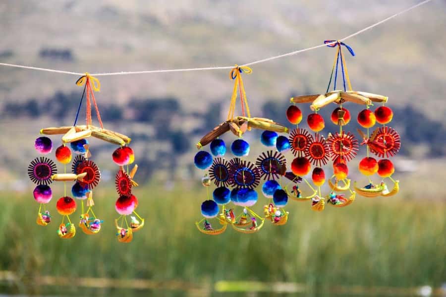 Half Day Guided Lake Titicaca Tour to Uros Floating Islands - Uros Floating Islands: stepping onto totora reed life