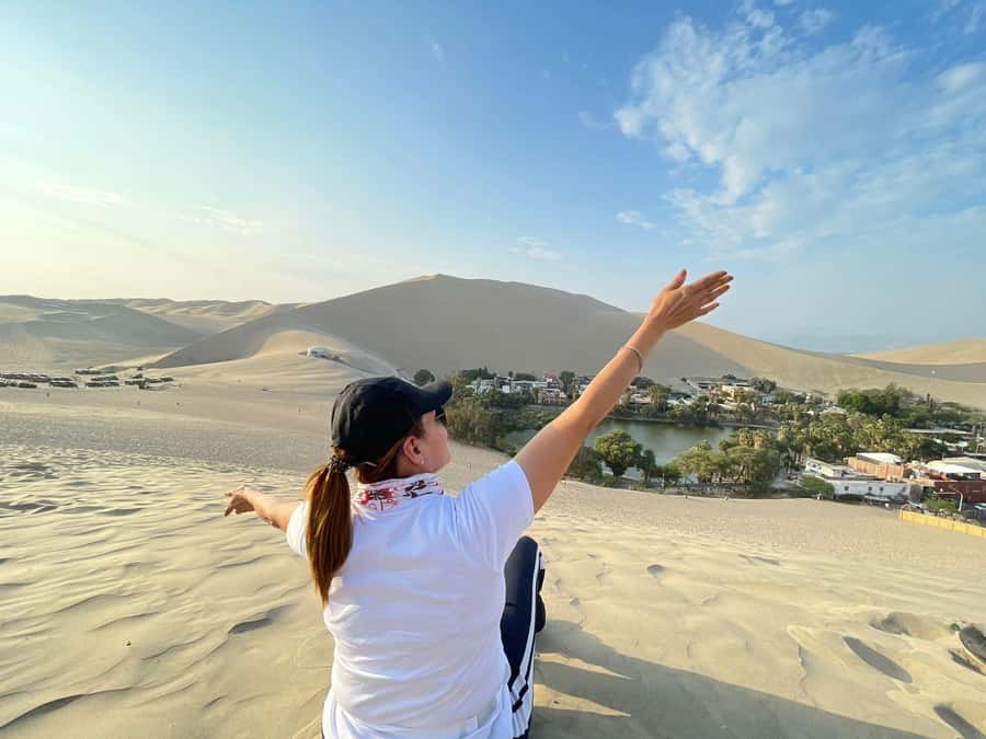 Lima: Paracas & Huacachina Oasis Day Trip with Wine & Dunes - Huacachina Oasis: the promenade first, then dune buggy and sandboarding