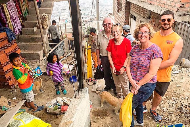Lima Shanty Town Tour-Local Life Experience - Climbing the iconic yellow stairs in Villa el Salvador