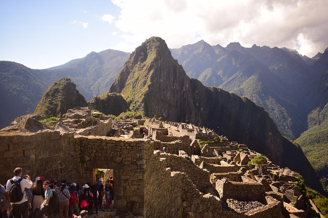 Machupicchu full day private tour - Train to Aguas Calientes, meeting instructions, and the bus-to-the-top moment
