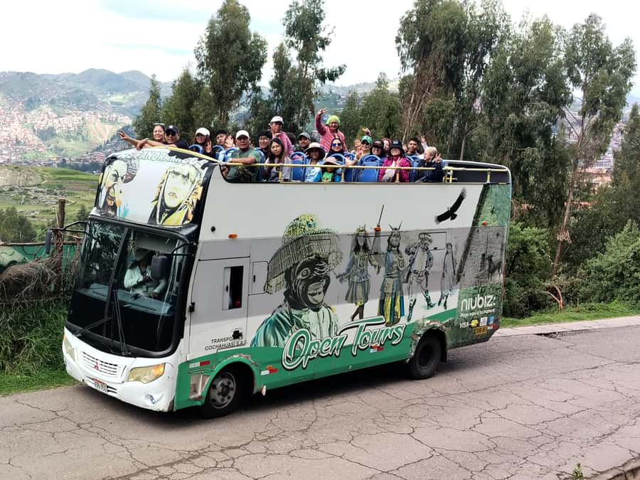 Open-top bus in the city of Cusco, 3-hour tour with panoramic views - Llaullikasa cultural center: Payment to the Earth, plus llama and alpaca lessons