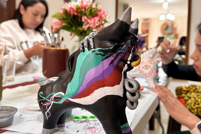 Private painting workshop with wine and snacks - What you paint: Pucará bull and Cusco School of Art styles