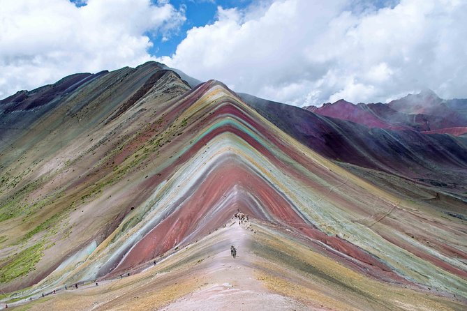 Rainbow Mountain Day Trip from Cusco - Full Day Guided Adventure - The descent back to Quesiuno, then transport to Hanchipacha for lunch