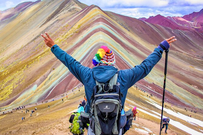 Rainbow Mountain Full Day Hike from Cusco with Local Guide - Climbing toward Vinicunca: rolling hills, steep sections, and famous colors