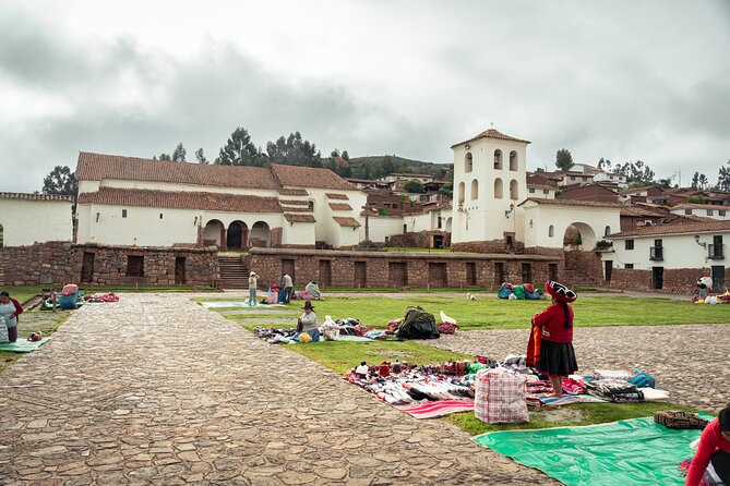 Sacred Valley Day Trip from Cusco with Maras & Moray - Chinchero: Inca palace walls under Spanish earth, plus textiles and camelids