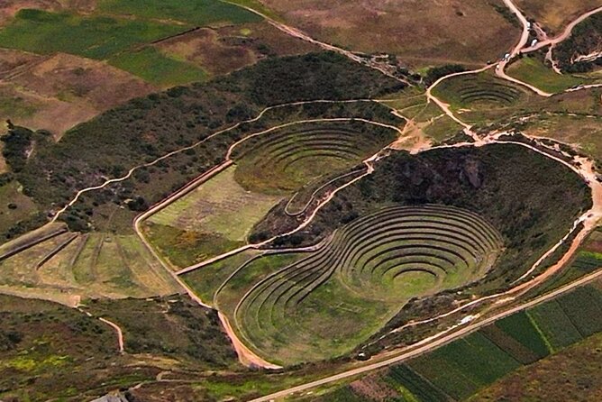 Sacred Valley of the Incas Tour - Pisac market and the Inca terraces behind the stalls