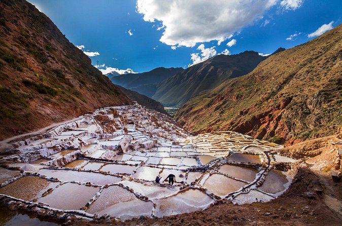 Sacred Valley of the Incas with Moray and Salt mines - Chinchero, Inca stone plus a 16th-century church and alpaca textiles