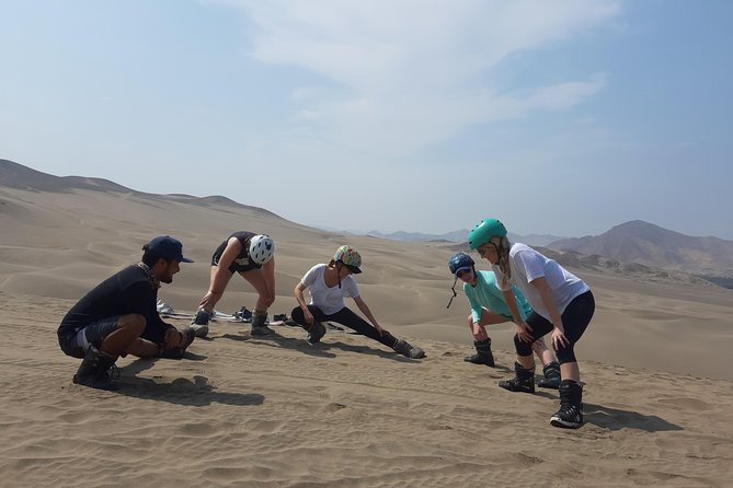 Sandboarding Experience Lima Includes Boots, Bindings & Helment - Riding the dunes by 4x4, seatbelt safety, and ocean-to-sand views