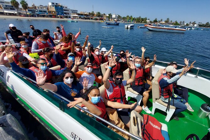 Visit Paracas and Huacachina, a fantastic day with all inclusive - Stop 3, Huacachina: Buggy Speed, Sandboarding, and Sunset Photos by the Lagoon