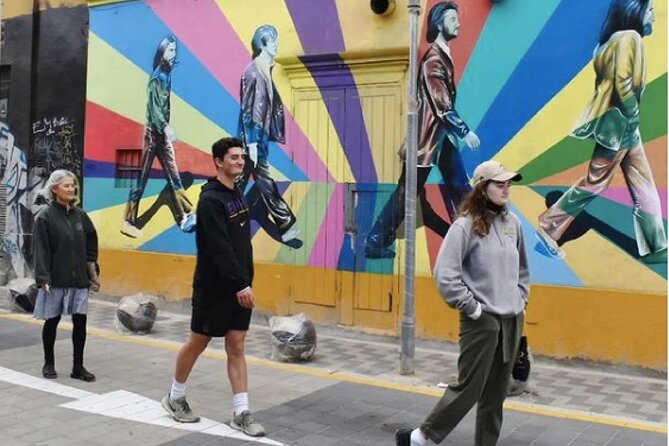 Walking Tour in the Barranco Lima - La Bajada de Baños: cliffside steps, wave noise, and photo-ready drama