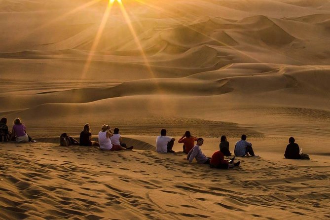 Wine, Pisco and Dune Buggy Experience - Huacachina dunes: buggy ride, sandboarding practice, and sunset